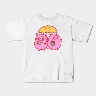 Pigs under a yellow umbrella Kids T-Shirt